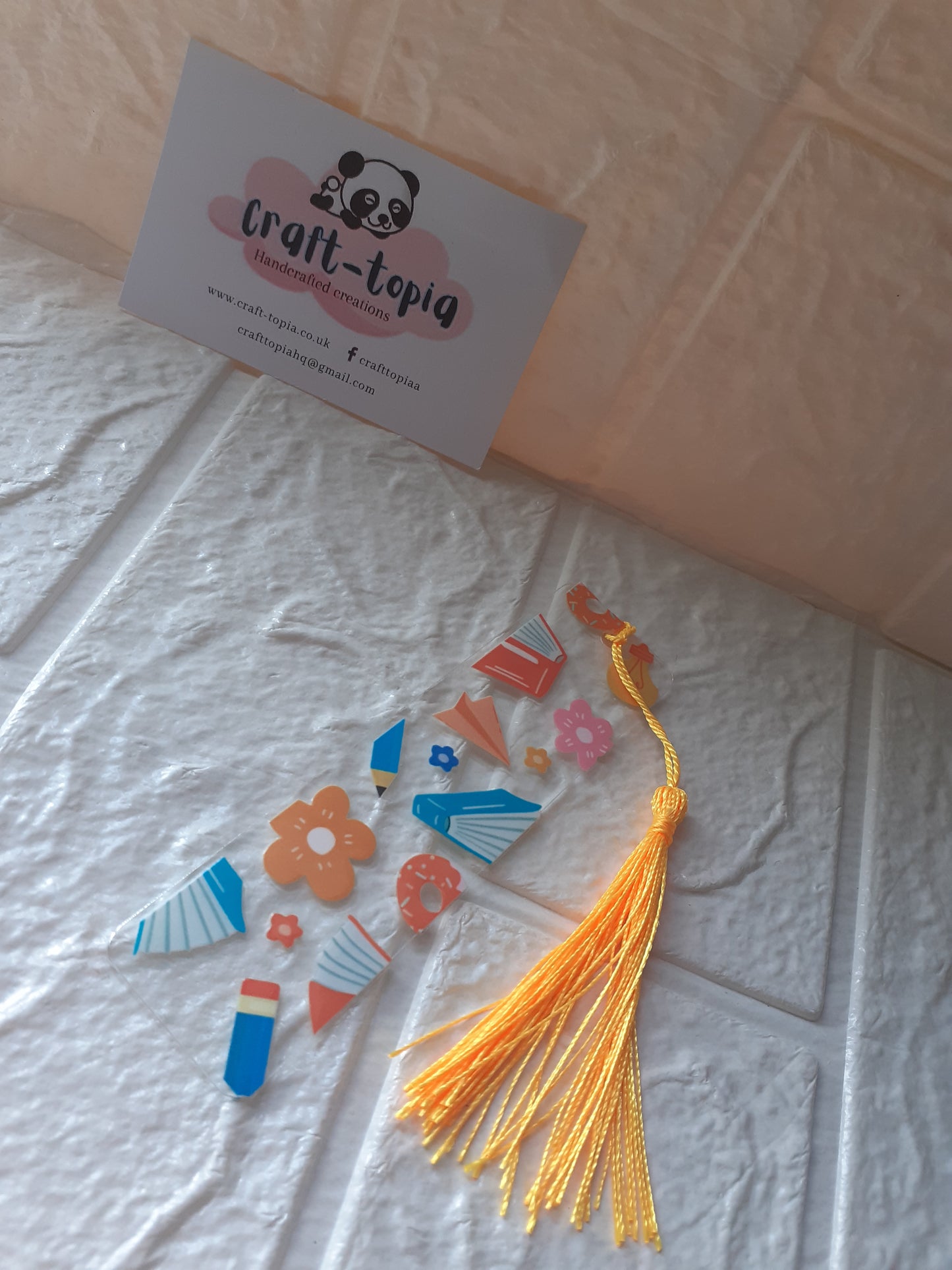 book,flowers,pencil bookmark