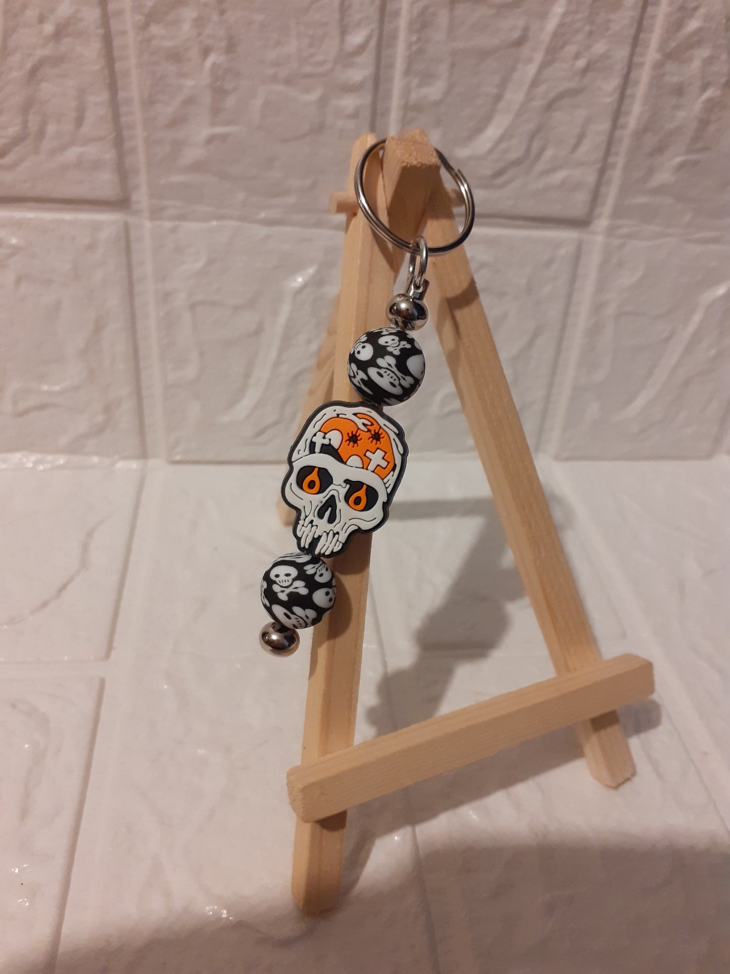 silver spooky skeleton keychain
