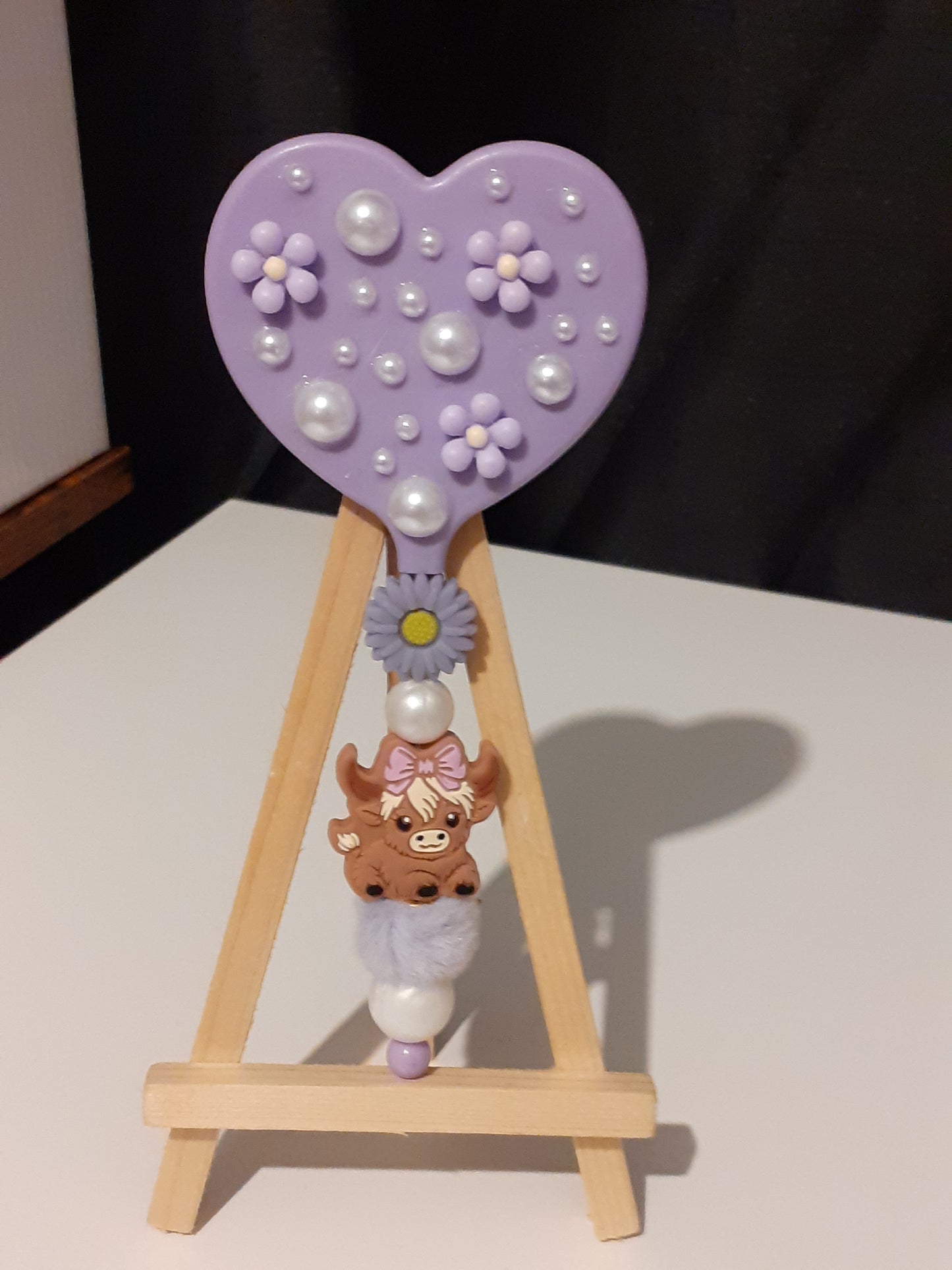 Beaded heart shaped mirror