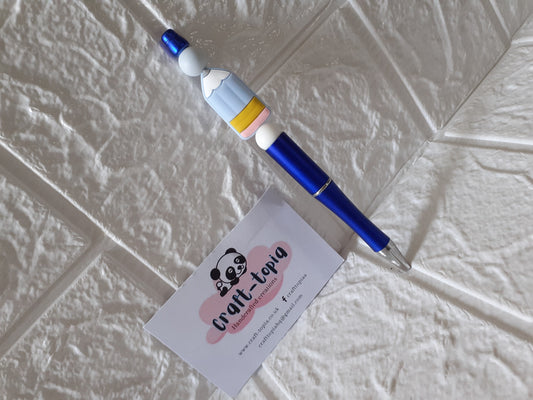 dark blue pencil design pen