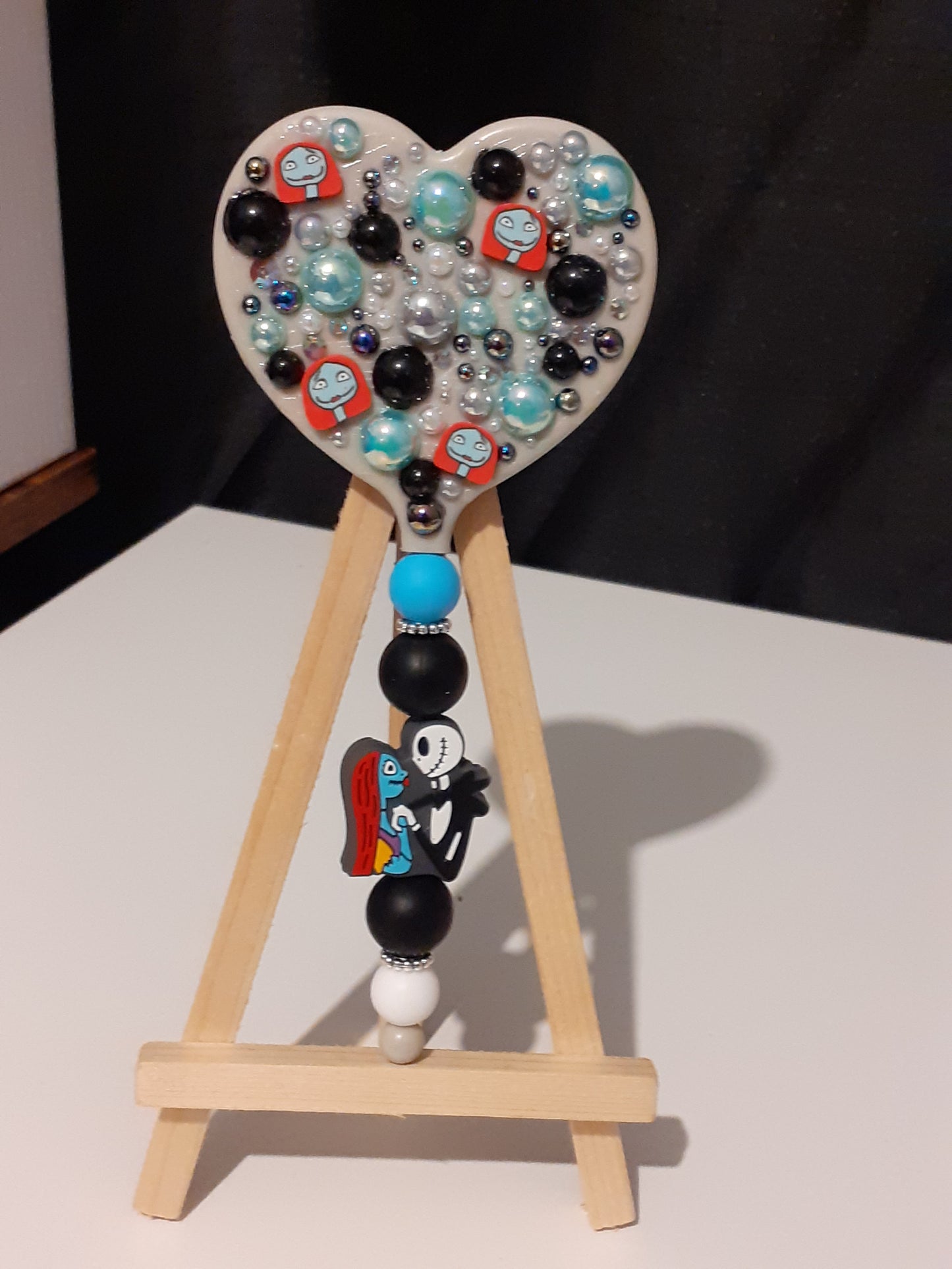 Beaded heart shaped mirror