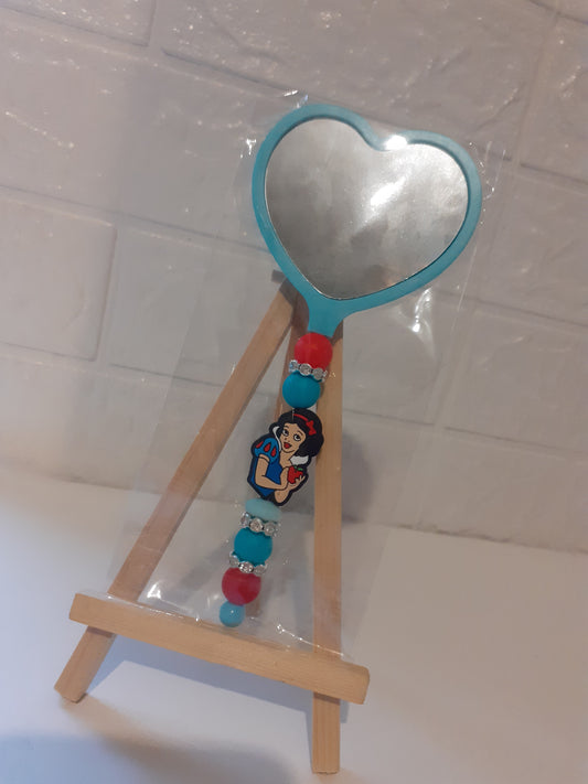 Beaded heart shaped mirror