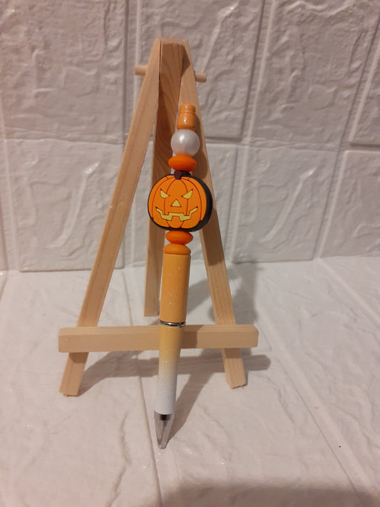orange pumpkin pen